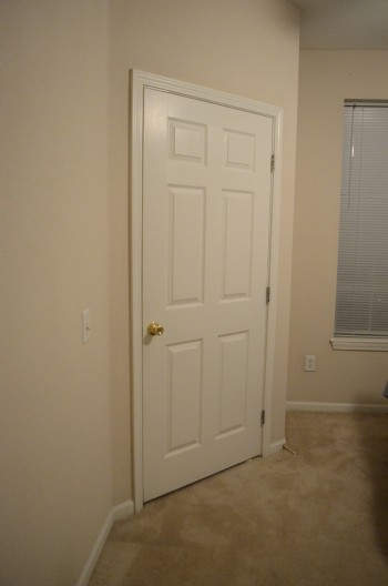The baby room in original paint color. Image 2.