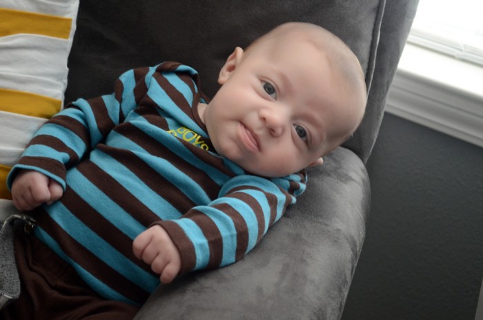 3-month_monkey-stripes_arm-chair-smirk